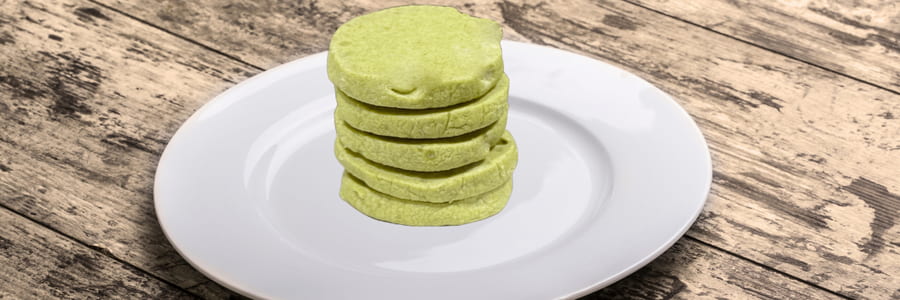 Moringa shortbread cookie on white plate | tea + munchies | Long Island, NY