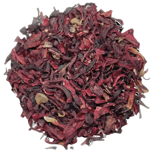 Loose leaf hibiscus flower herbal tea ingredients. The tea contains organic peppermint and hibiscus flower | tea + munchies