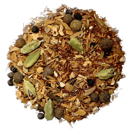 Loose leaf rooibos chai herbal tea ingredients. The tea contains organic ginger, red rooibos, cinnamon, cardamom, clove, allspice, and black pepper | tea + munchies
