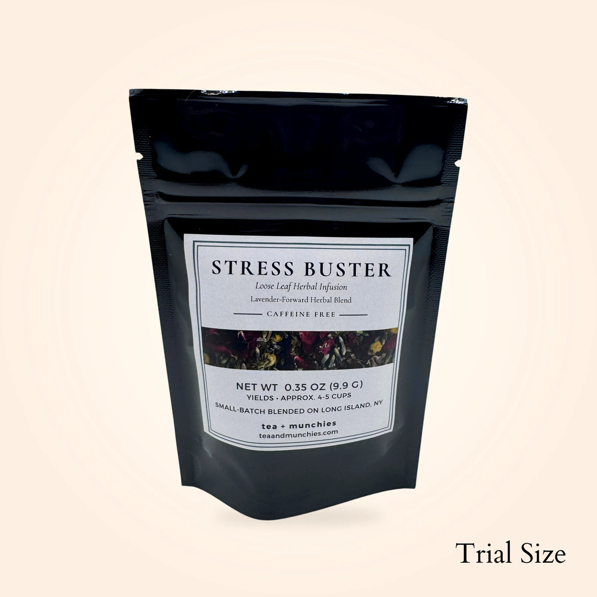 A black stand-up pouch of Stress Buster loose leaf herbal infusion tea by tea + munchies, shown on a light beige background with 'Trial Size' text in the bottom right corner.