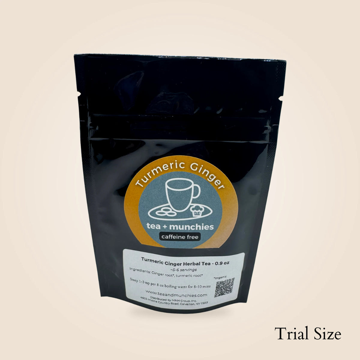 A black stand-up pouch of Turmeric Ginger Herbal Tea by tea + munchies, shown on a light beige background with 'Trial Size' text in the bottom right corner.