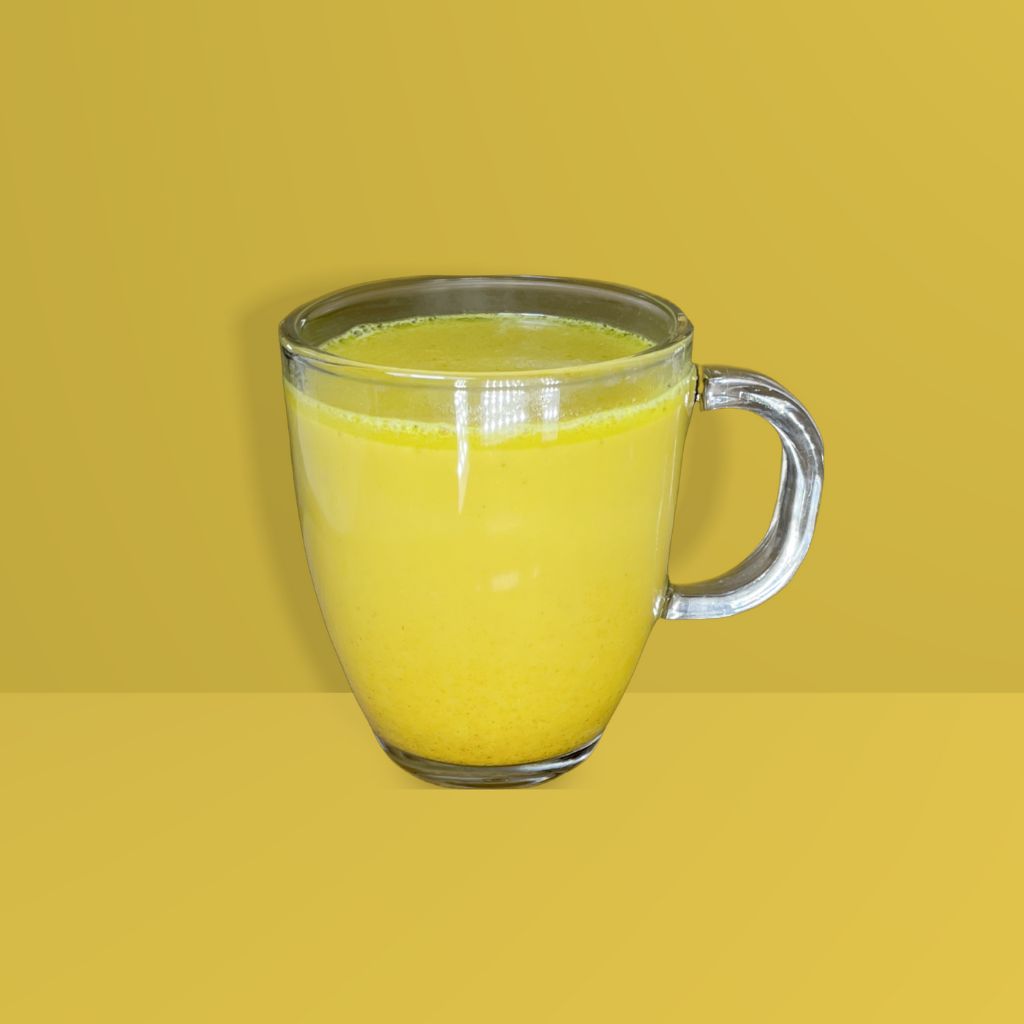 Brewed golden milk herbal tea latte made with vanilla almond milk | tea + munchies