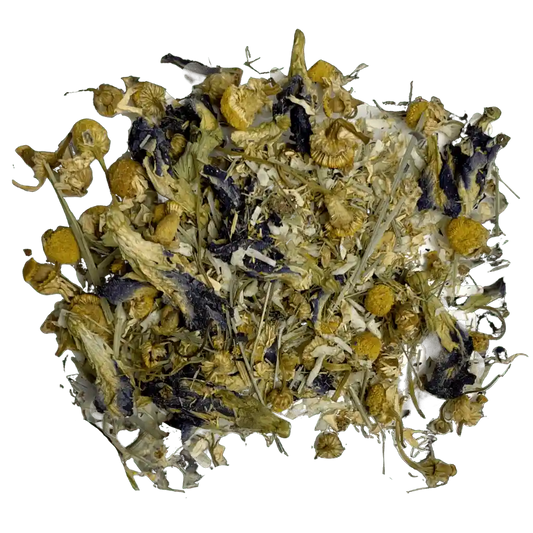 Loose leaf blue magic herbal tea ingredients. The tea contains lemongrass, orange peel, organic butterfly pea flower, coconut, and chamomile | tea + munchies