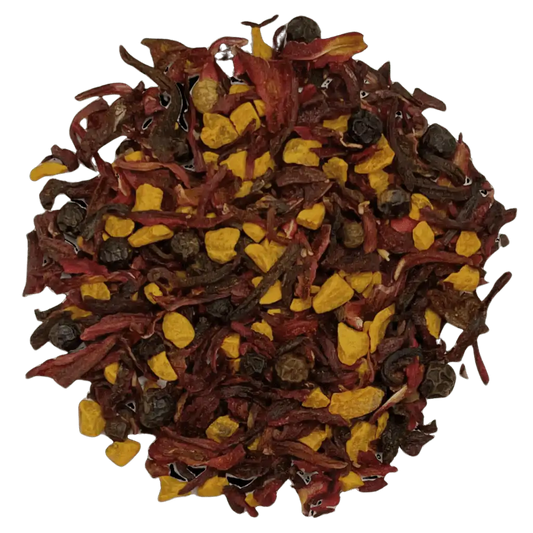 Loose leaf hibiscus turmeric herbal tea ingredients. The tea contains organic turmeric root, hibiscus flower, and black peppercorn | tea + munchies