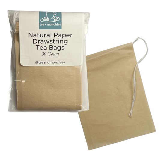Front side of package of 30 natural paper drawstring tea bags and one standalone tea bag | tea + munchies