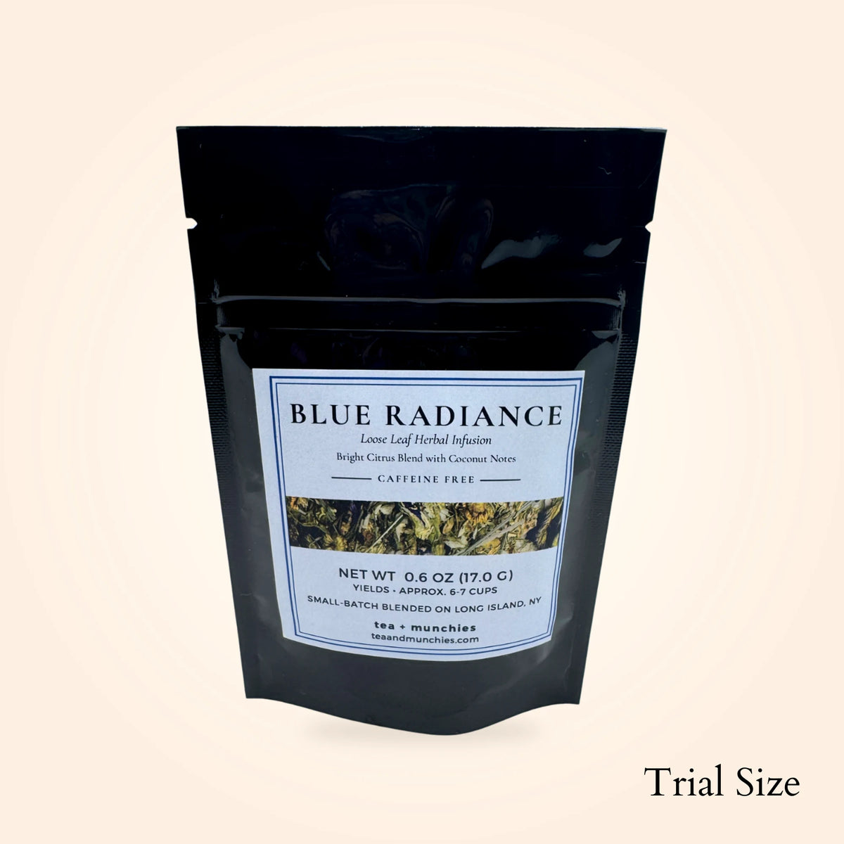 A black stand-up pouch of Blue Radiance loose leaf herbal infusion tea on a light beige background, with 'Trial Size' text in the bottom right corner.