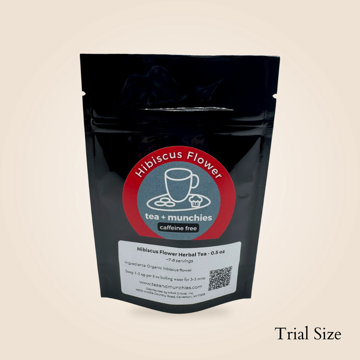 A black stand-up pouch of Hibiscus Flower Herbal Tea by tea + munchies, shown on a light beige background with the text 'Trial Size' in the bottom right corner.