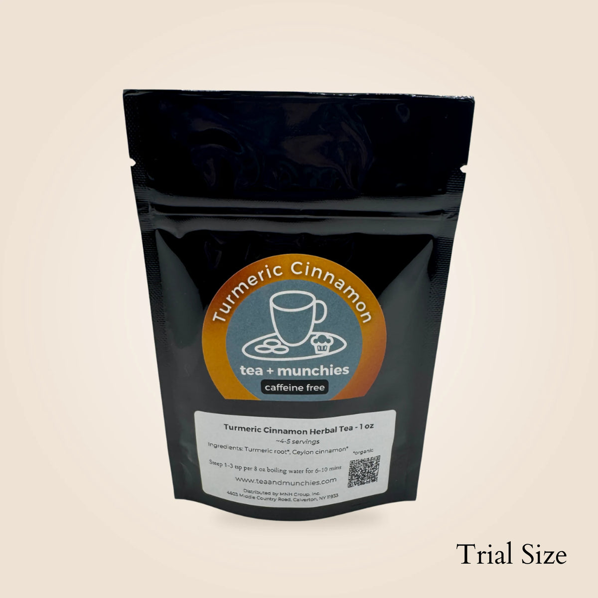 A black resealable stand-up pouch of tea + munchies Turmeric Cinnamon herbal tea, shown on a plain light beige background with the words 'Trial Size' in the bottom right corner.