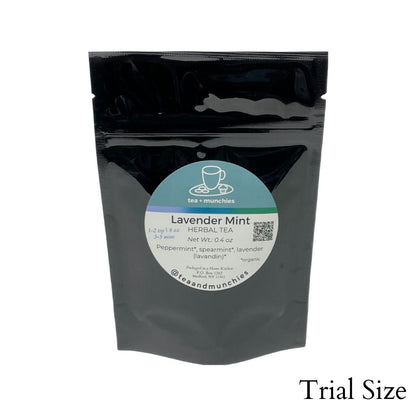 Resealable black glossy stand-up package of trial size loose leaf lavender mint herbal tea on white background. 'Trial size' written in lower right hand corner | tea + munchies