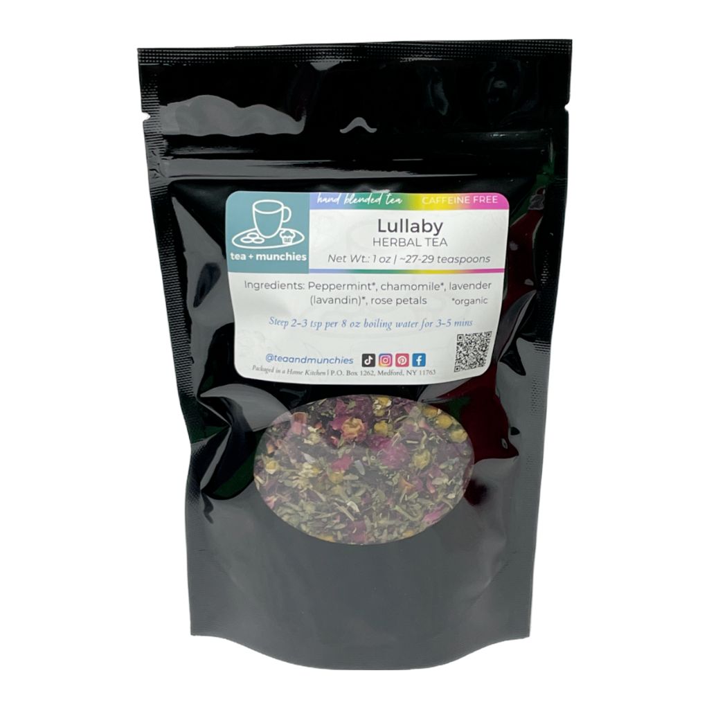 Resealable black glossy stand-up package of loose leaf lullaby herbal tea on white background | tea + munchies