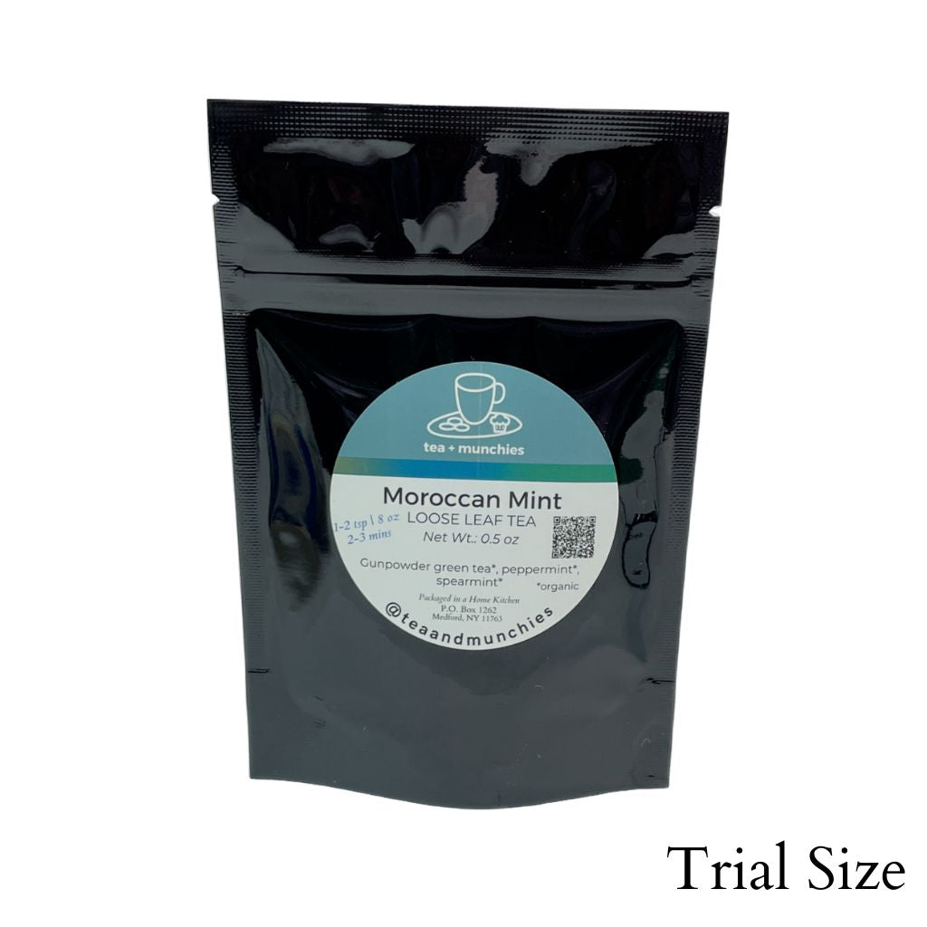 Resealable black glossy stand-up trial size package of loose leaf moroccan mint tea on white background. 'Trial size' written in lower right hand corner | tea + munchies