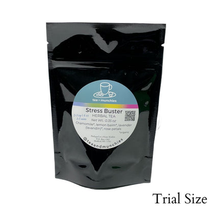 Resealable black glossy stand-up package of trial size loose leaf stress buster herbal tea on white background. 'Trial size' written in lower right hand corner | tea + munchies